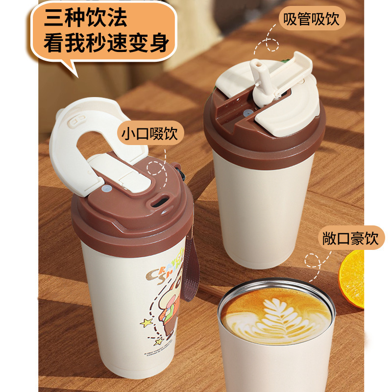 Một cây bút chì, một tách cà phê cho sinh viên với một ngụm thép không gỉ.