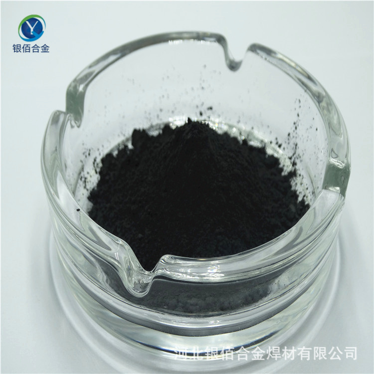 Black and non-formal, titanium carbon powder, used as metal ceramics for cutting.