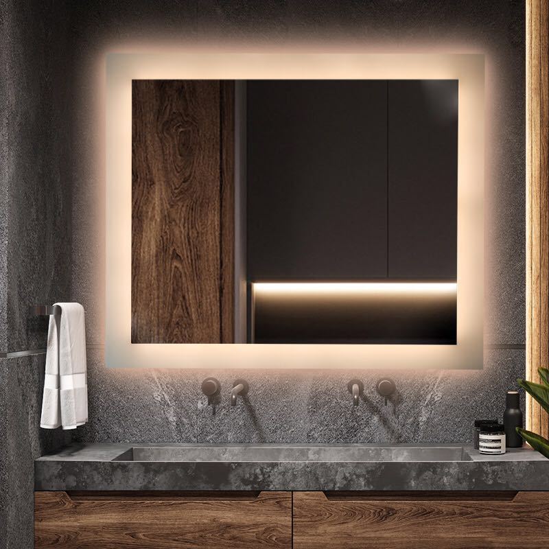 A rectangular bathroom mirror with a light wall wall and a fogproof bathroom mirror backlight