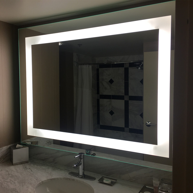 Large-sized smart bathroom mirror with a light-protected shower mirror touch screen