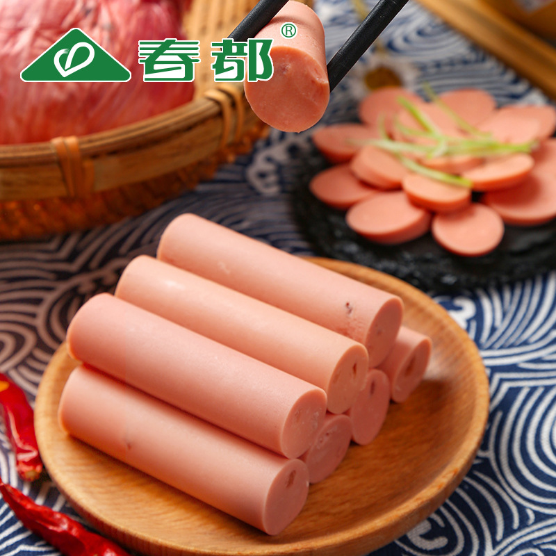 A box full of ham sausages from a 50-gram corrugal sausage delivery box.