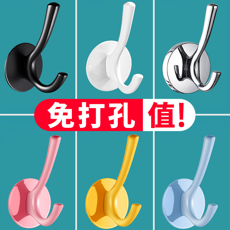 Những cái móc tưởng tượng trên tường phía sau tường bằng những cái móc dính chắc.