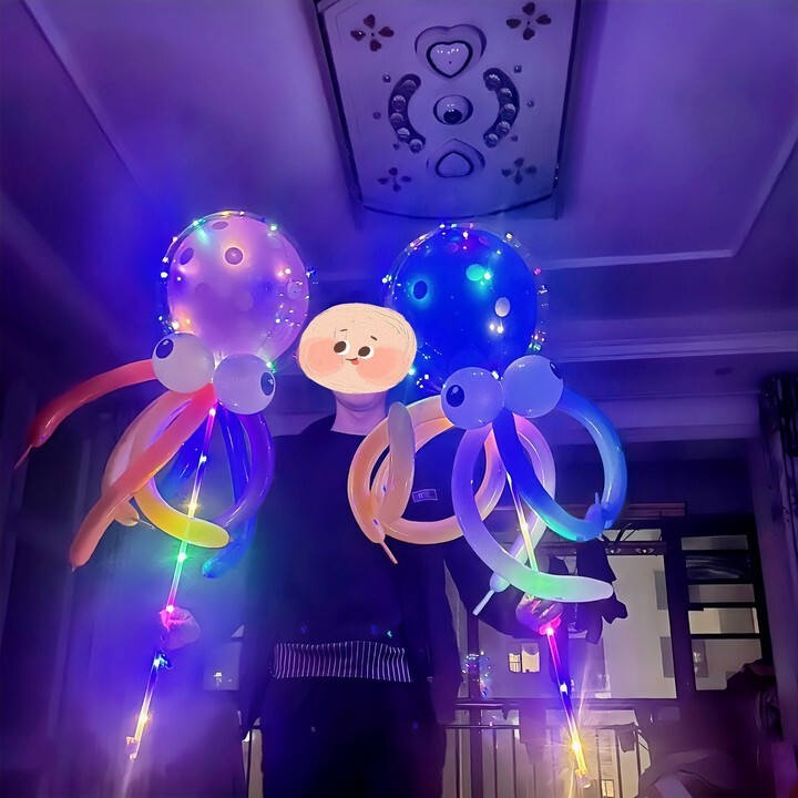 The net-flying skyball balloons are flying up and out, and the octopus kids are selling balloons all over the street.