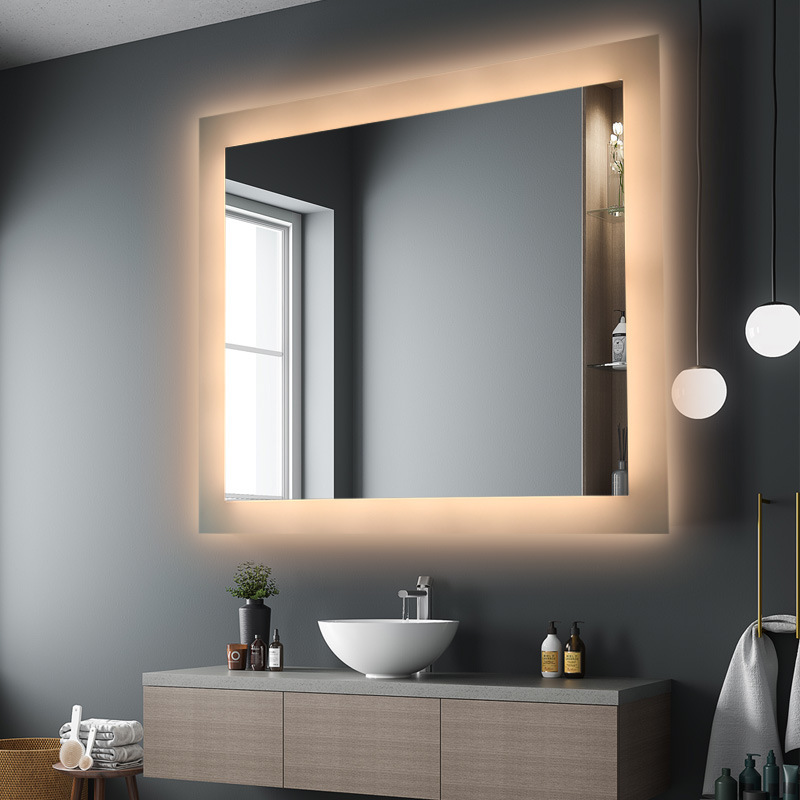 A rectangular bathroom mirror with a light wall wall and a fogproof bathroom mirror backlight