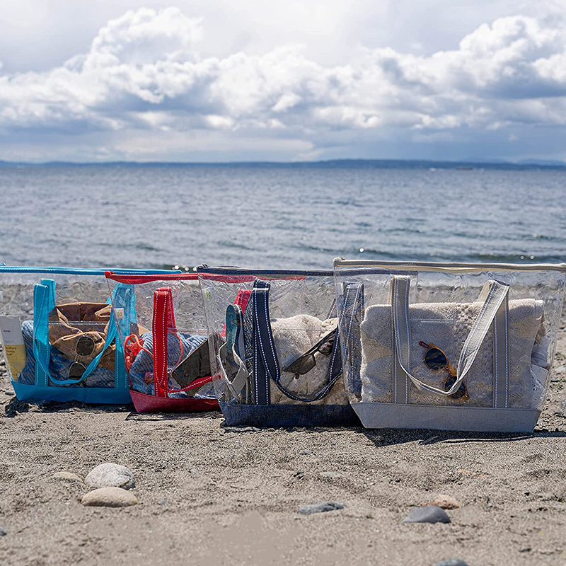 PVC transparency to pack a one-shoulder kit for a beach-proof trip.