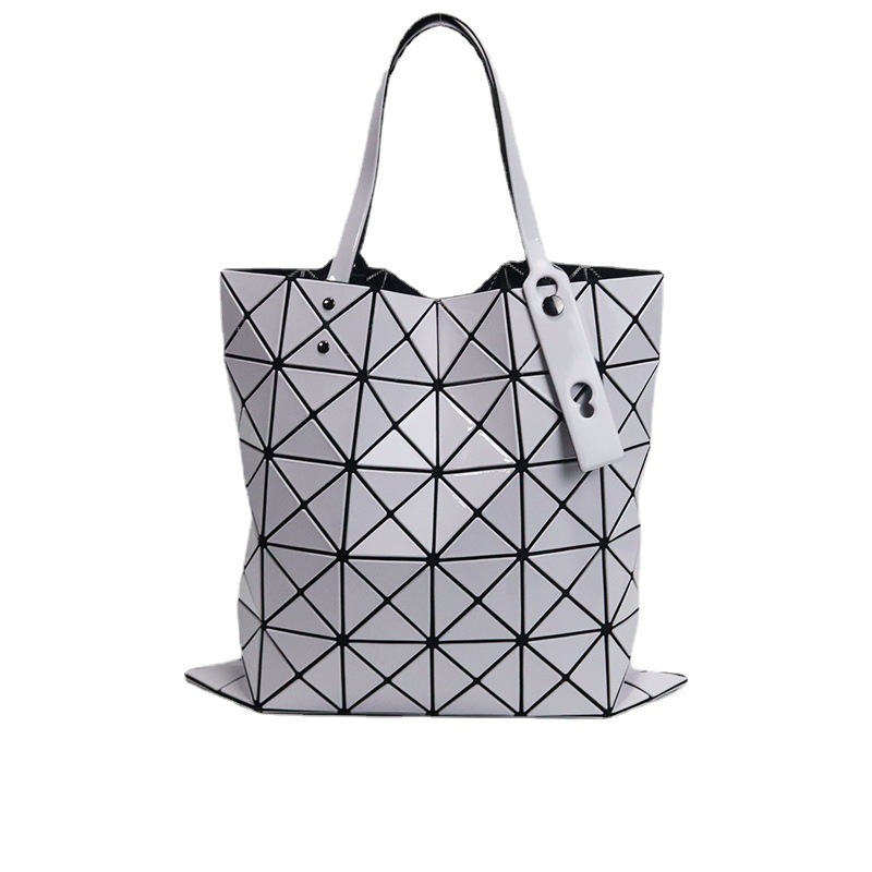 The new geometry package, 2022, Japanese pvc round, and the new handbag, Ms. Tate.