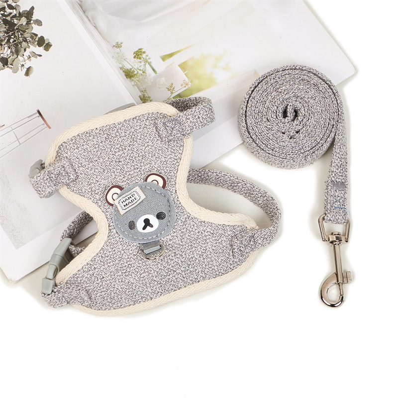 The pet tow rope vests the cat's chest to protect him from the teddy bear.