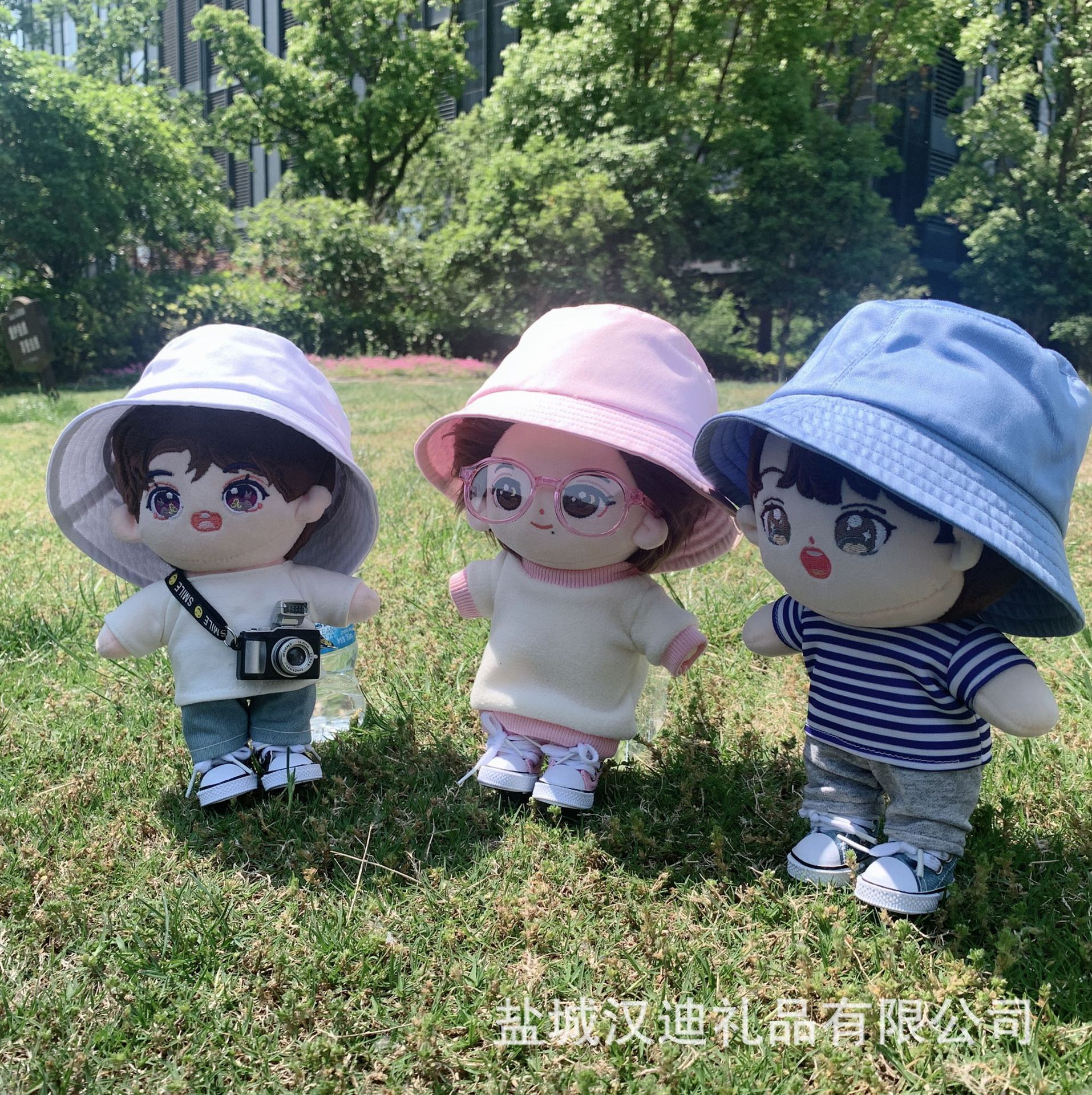 A 20-cm cotton doll costume for a doll with a fisher's hat on the hood.