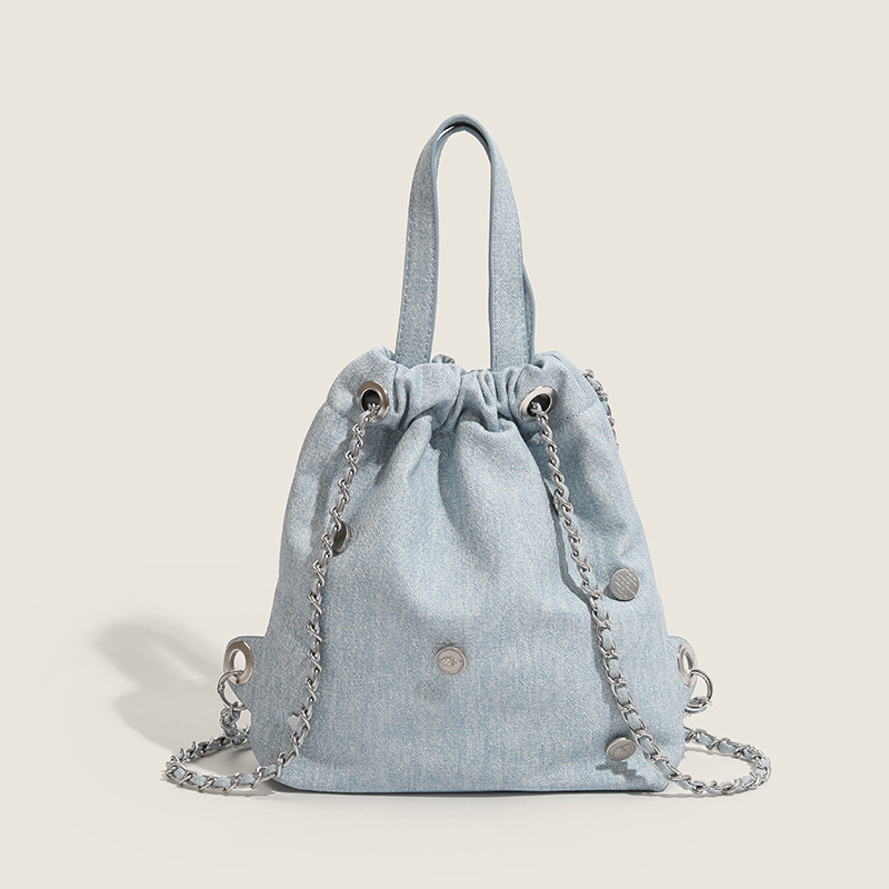 2023 new fashion cowboy buckets of water, a Korean-style recreational double-shoulder bag designed by the girls.