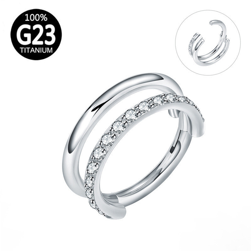 G23 body piercing double-coloured cylindrical noserings and nose nails.