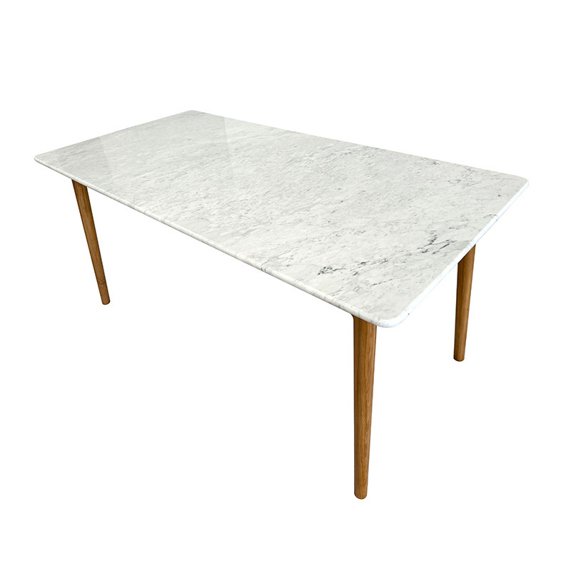 The rock board table is a small, modern, simple rectangular table.