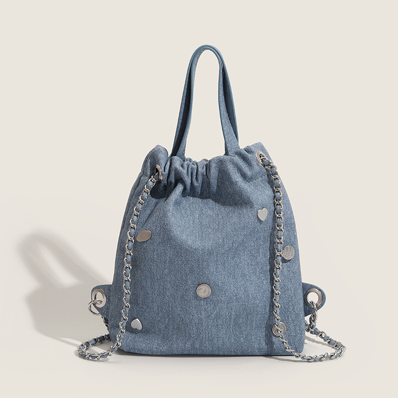 2023 new fashion cowboy buckets of water, a Korean-style recreational double-shoulder bag designed by the girls.