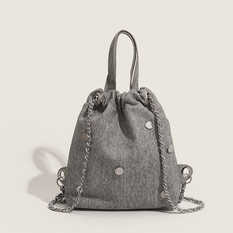2023 new fashion cowboy buckets of water, a Korean-style recreational double-shoulder bag designed by the girls.