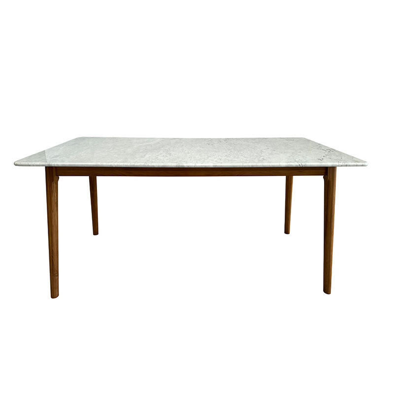 The rock board table is a small, modern, simple rectangular table.