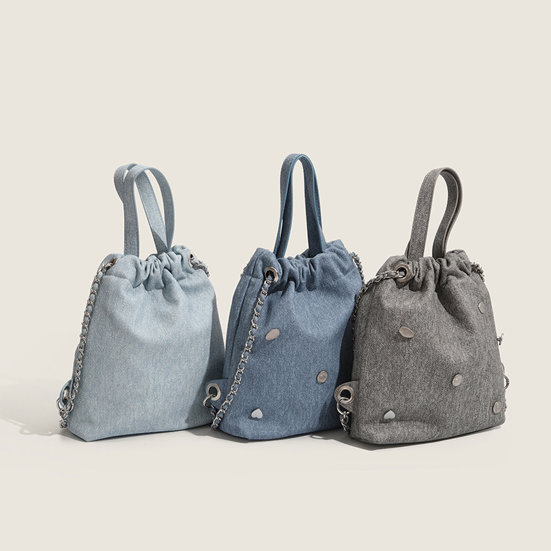 2023 new fashion cowboy buckets of water, a Korean-style recreational double-shoulder bag designed by the girls.