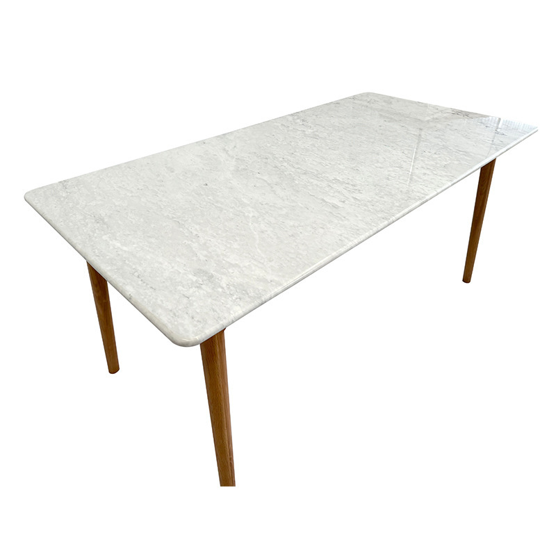 The rock board table is a small, modern, simple rectangular table.