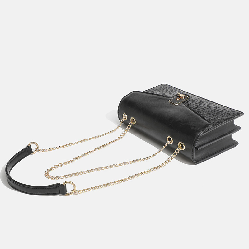 She's got a 2024-fashion, one-shoulder-linked, red-sweet bag.