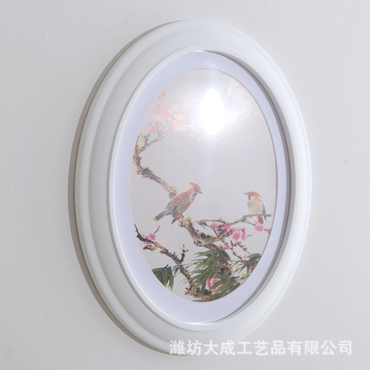 An elliptical frame creative frame, a simple decorative background wall, a wholesale elliptical frame.