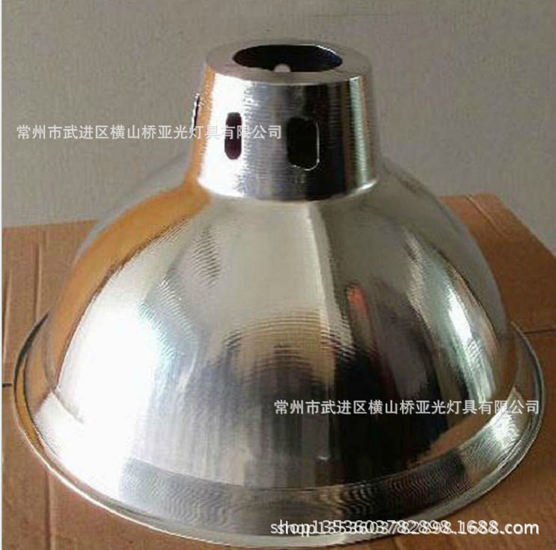 A 19-inch striped diamond mask, a hexagoned diamond mask, a variety of worker-mine lamps.