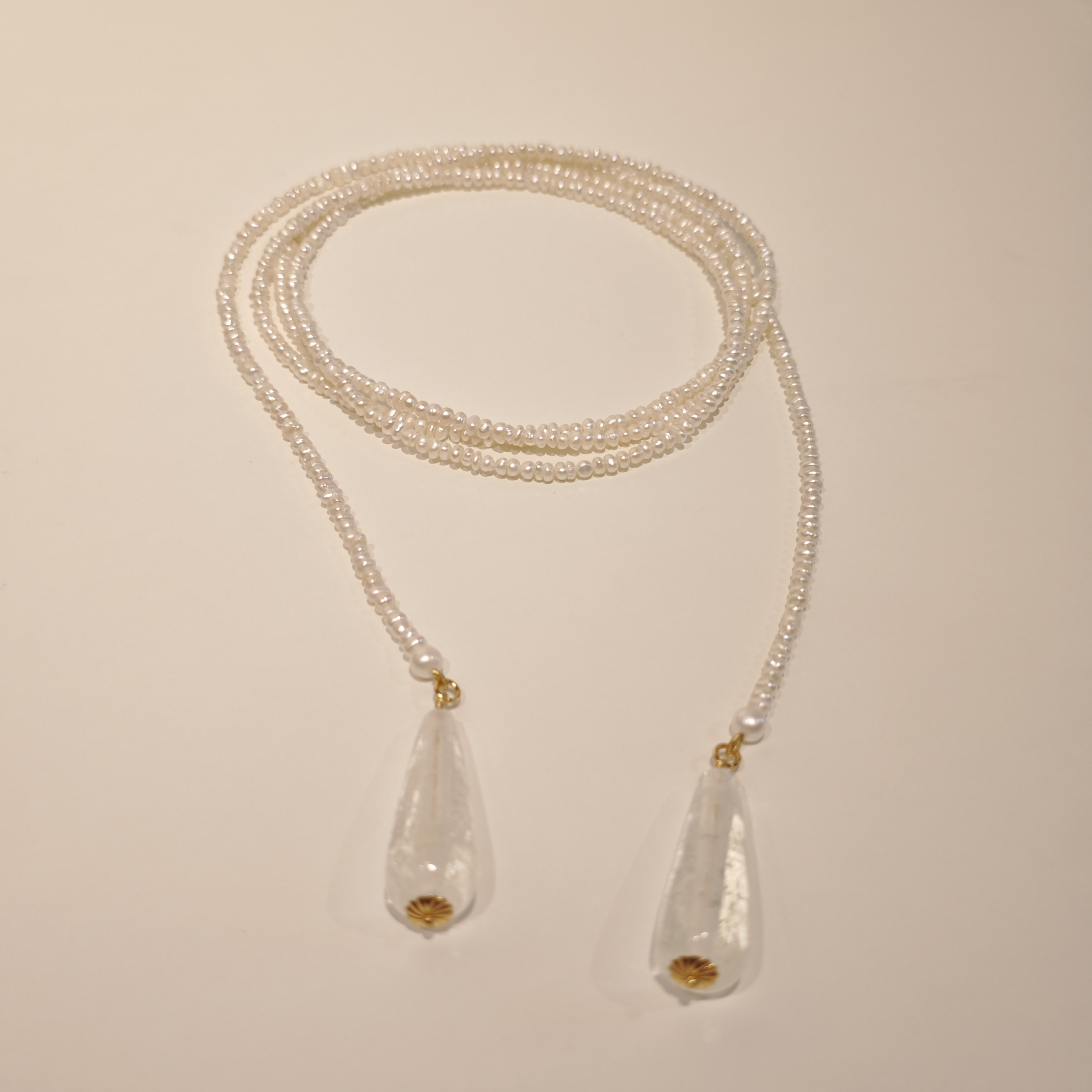 Korea's Geometric Pearl long money chain, with a chivalry neck chain chain, is about 100 bahts and a retrospect.