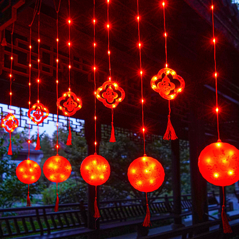 New Year 2023 New Year's Spring Lights, red lanterns decorated curtain lanterns, outdoors.