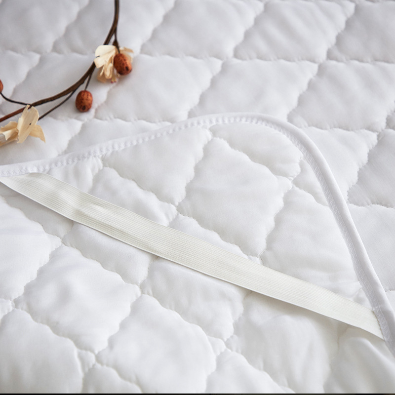 Hotel mattress for protection of hairy, weave-resistant cotton.