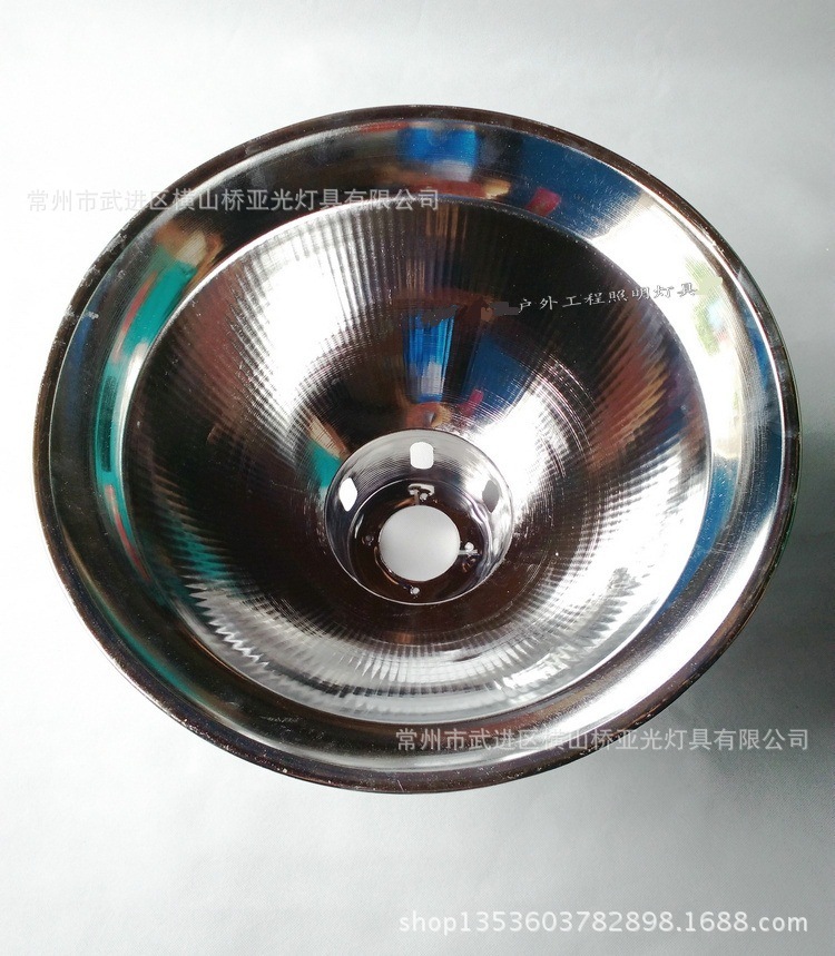 A 19-inch striped diamond mask, a hexagoned diamond mask, a variety of worker-mine lamps.