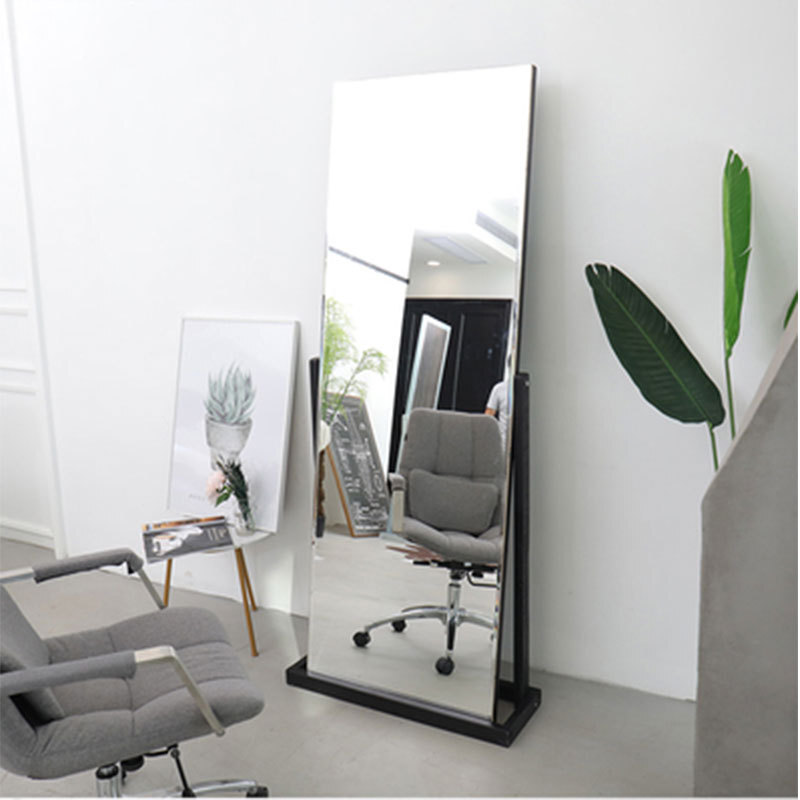 The hairdresser's mirror at the factory's wholesale-wood barber shop.