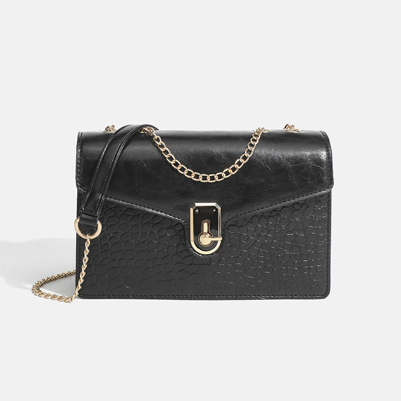 She's got a 2024-fashion, one-shoulder-linked, red-sweet bag.
