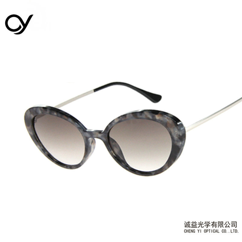 Cat-eyed sunglasses.