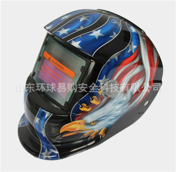 Welding mask on top of the head.