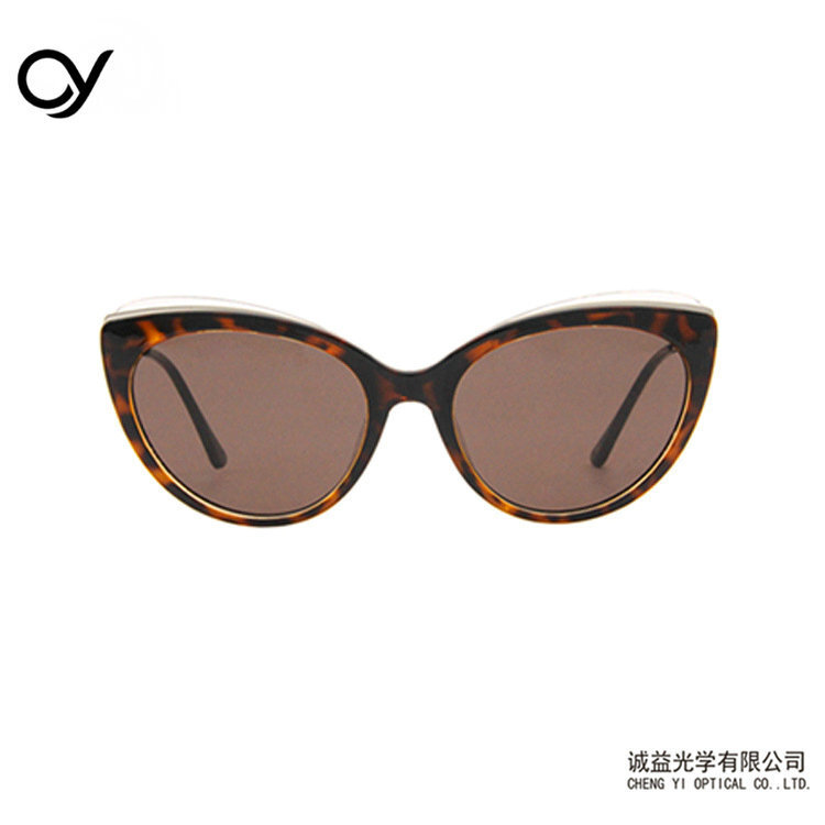 Cat-eyed sunglasses.