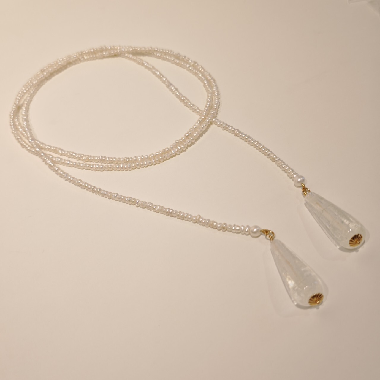Korea's Geometric Pearl long money chain, with a chivalry neck chain chain, is about 100 bahts and a retrospect.