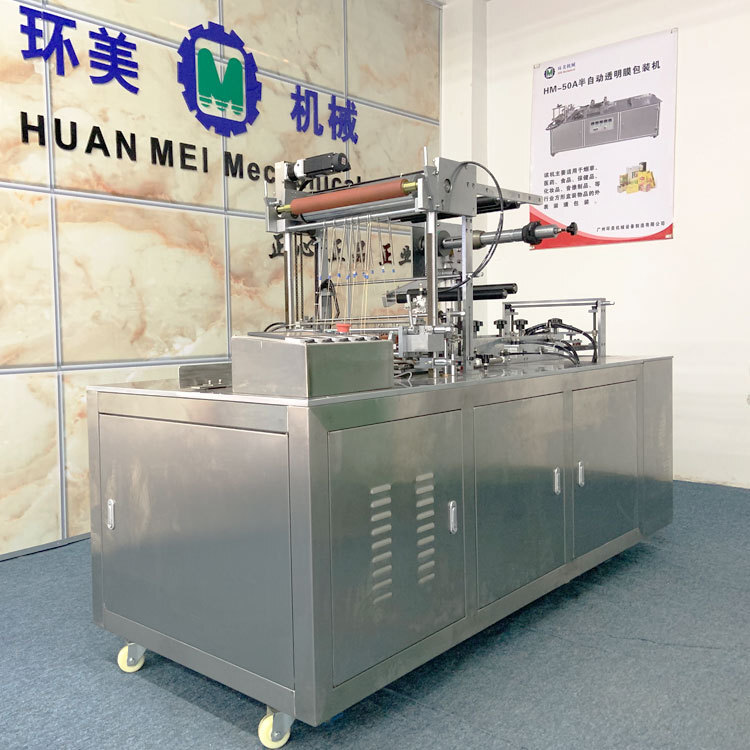 HM-200 fully automated transparent membrane packaging machine, pharmaceutical health product assembly membrane machine