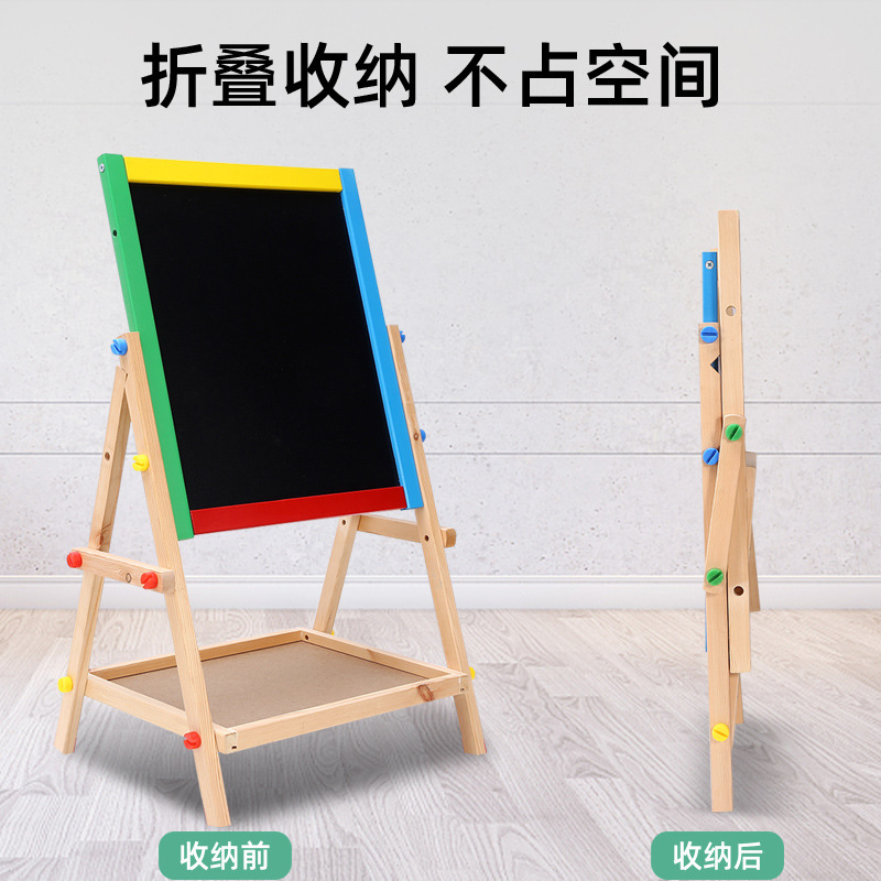 Two-sided blackboards for children can rise up to paint board colored paints, two and a toy.