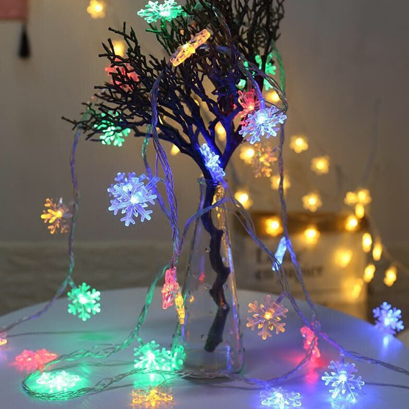 The Christmas LED LED LED light lit with the star cell USB decorator light lit with the light.