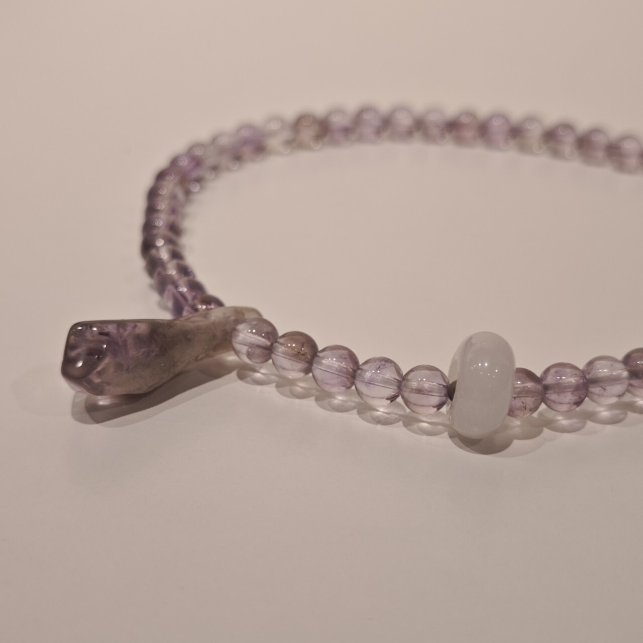 A birthday present from the purple crystal chain, the purple natural mine, with the vibrator string.