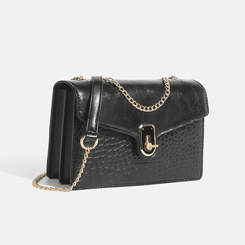 She's got a 2024-fashion, one-shoulder-linked, red-sweet bag.