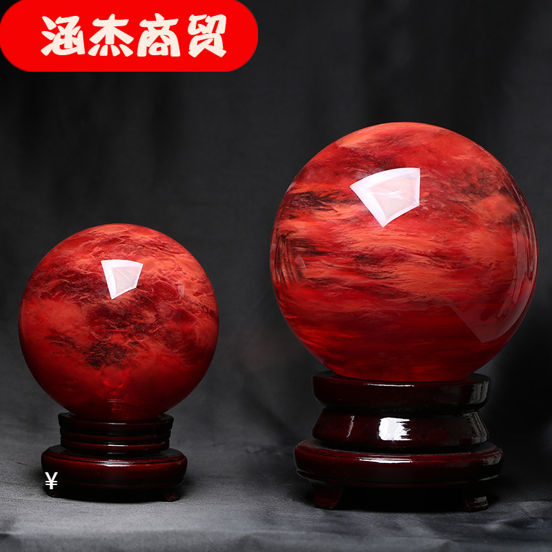 Wholesale of natural crystal ball smelting, red and white crystal ballers with a big-time headpiece.