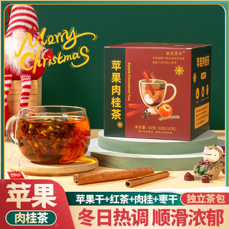 Đất nước trà trái cây, cái hộp tam giác hình tam giác hình táo với một túi đầy trà, táo quế và quế.