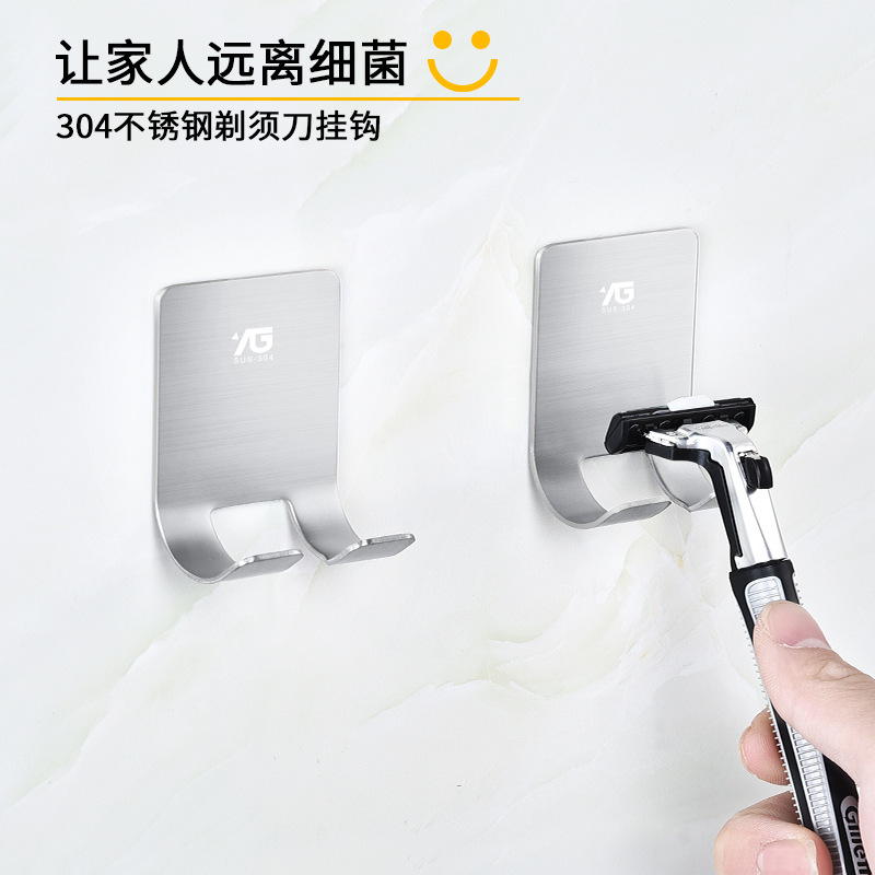 Dao cạo thép không rỉ treo lên, và nó không đâm vào lỗ.