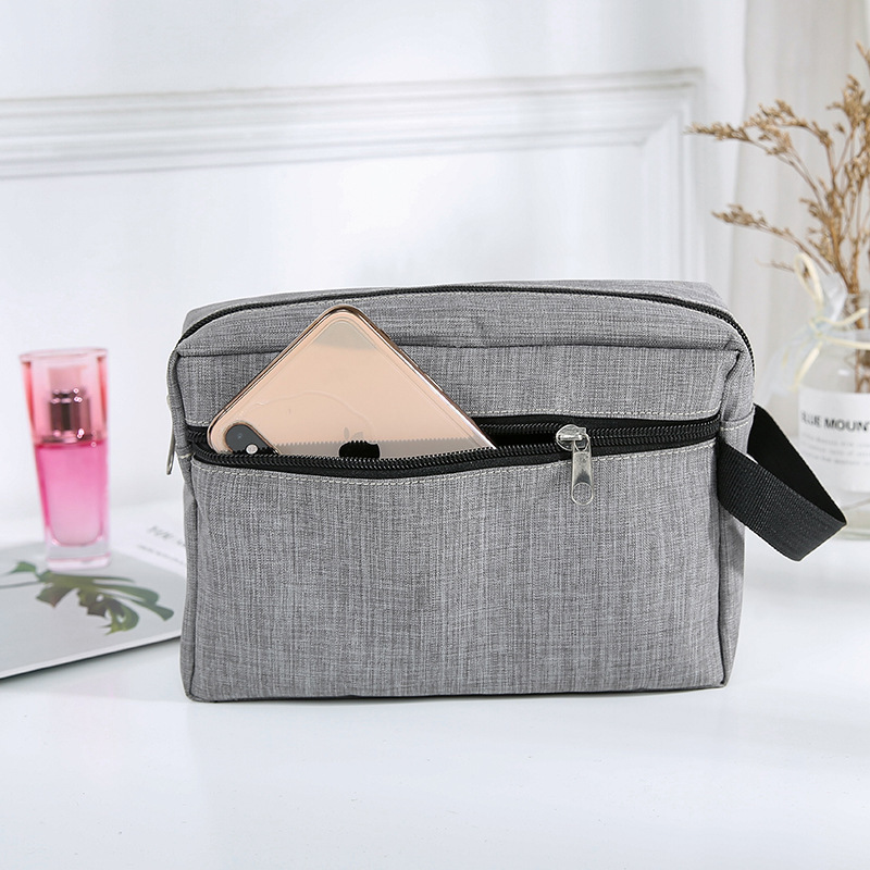 Customize hand-held double-layered ladies men's make-up bags for multi-purpose waterproof Oxford rags.