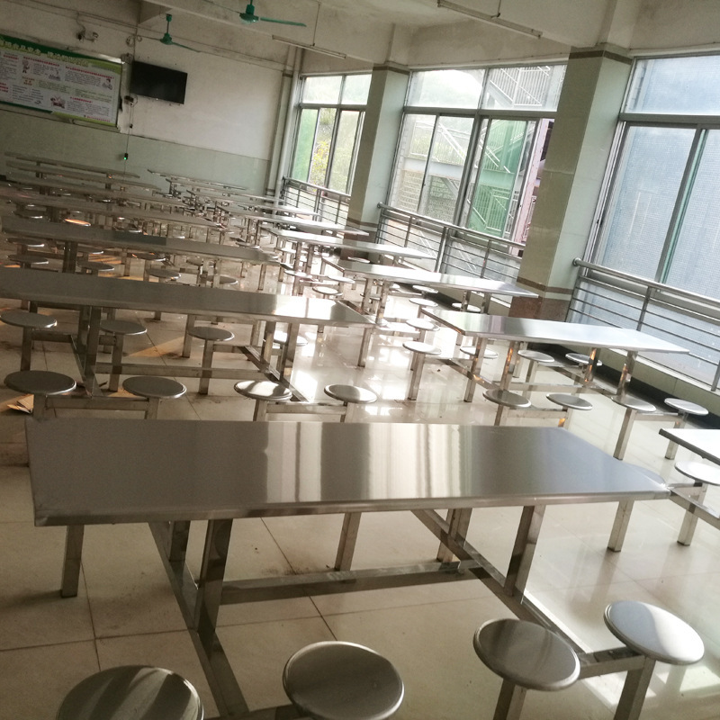 The factory's stainless steel table with the dining hall table and the round table with the stainless steel table.