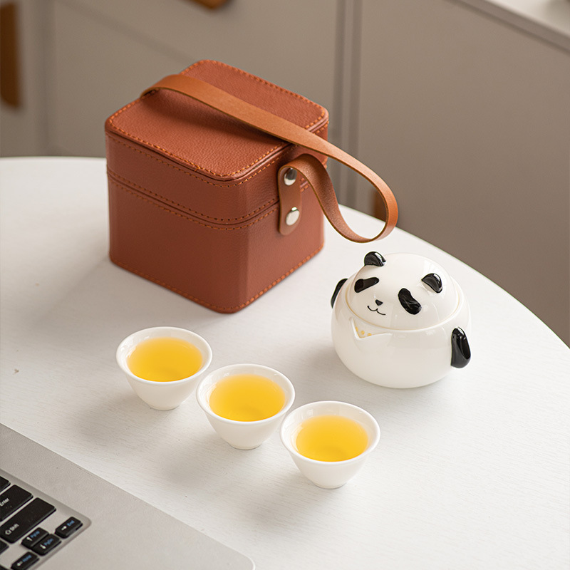 National tide panda hand-held tea kit with a pot of three cups of dry bubbles.