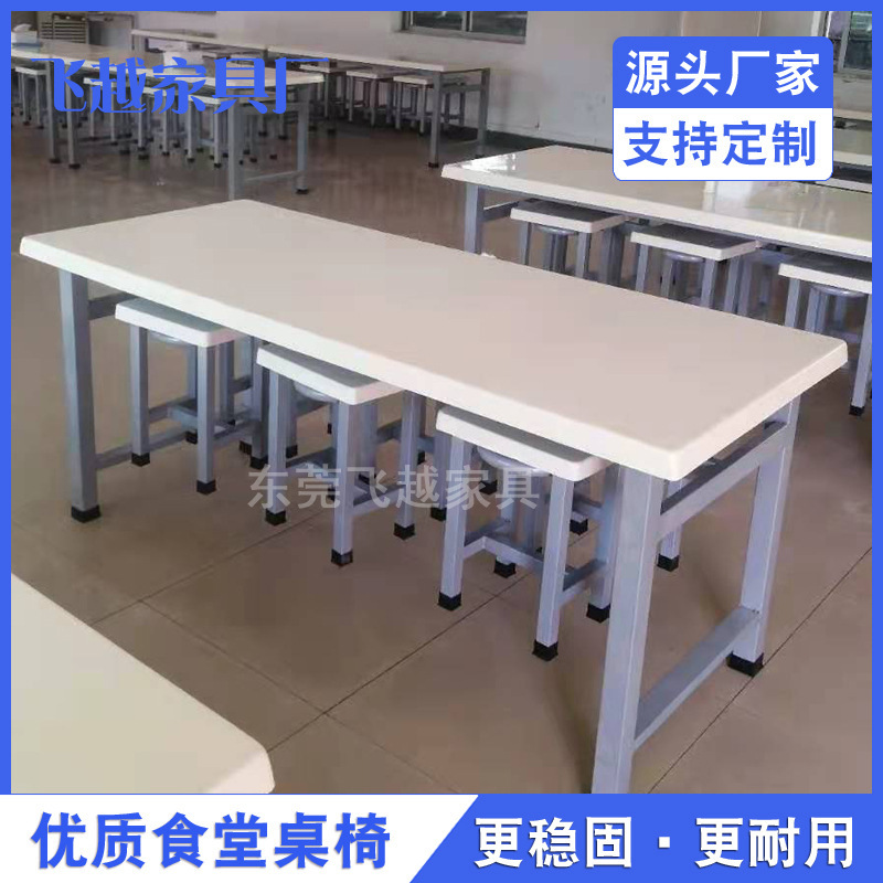 The factory employees' dining room table folds up the bench table so that the tables and chairs are thickened and reinforced.