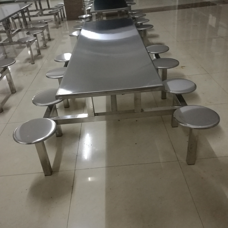 The factory's stainless steel table with the dining hall table and the round table with the stainless steel table.