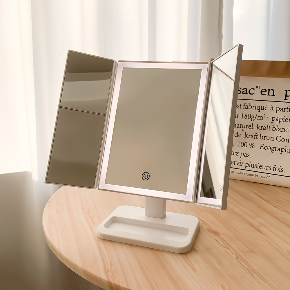 LED desktop dresser with a lamp on three sides of the shell mirror