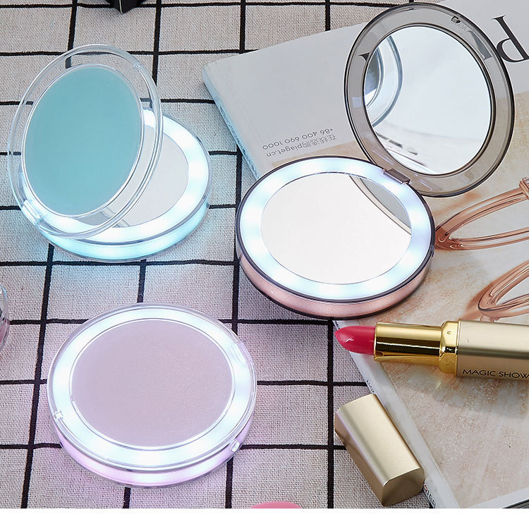 A Amazonled gift mirror with a round charge to hold the LED mirror together.