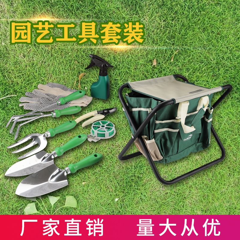 Một công cụ làm vườn ngoài trời cho việc làm vườn thép không rỉ, và một người làm vườn ngoài trời cho việc nâng cao hoa và người đi đường, nhà đặt với xẻng sắc nét.