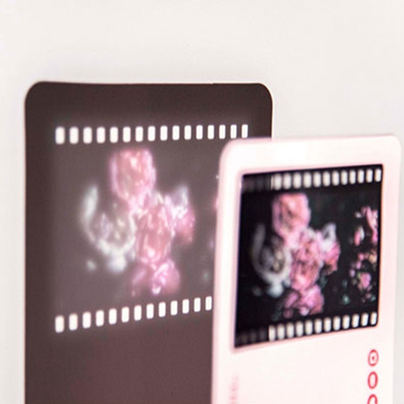 The film bookmark customised the flash card to write a message blank for the white couple's inverted film frame.